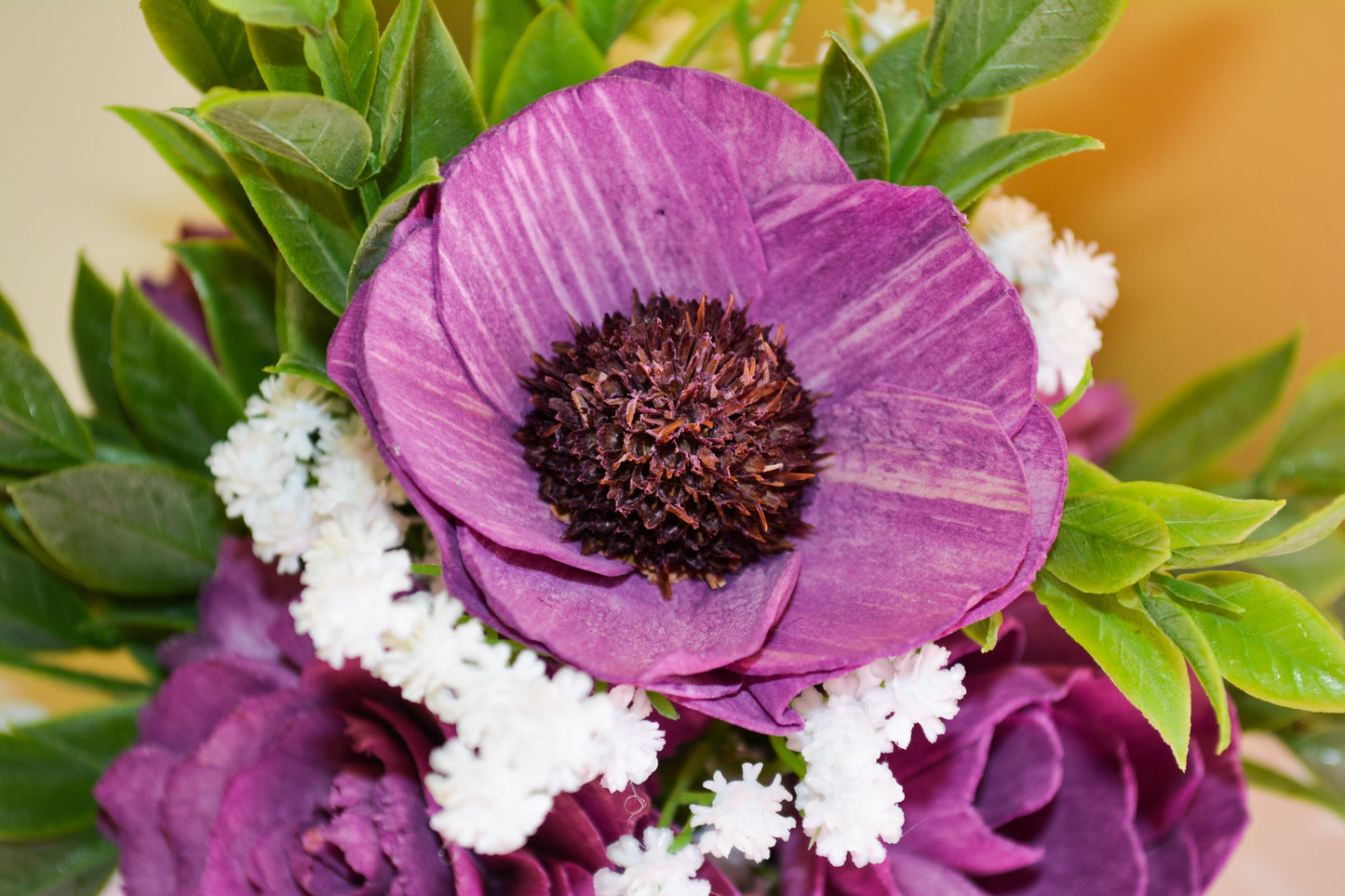 White Watering Can with Purple Flowers