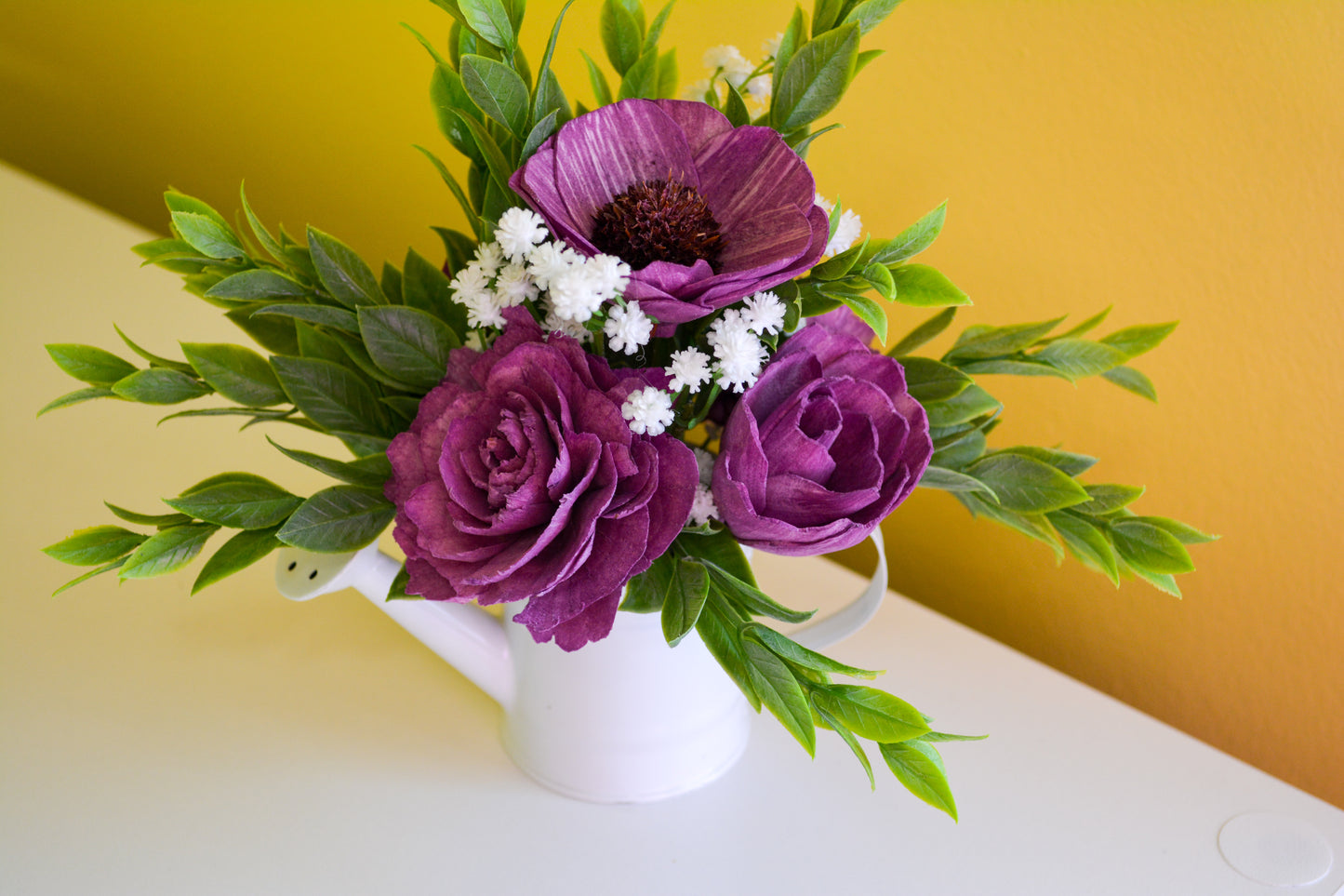 White Watering Can with Purple Flowers