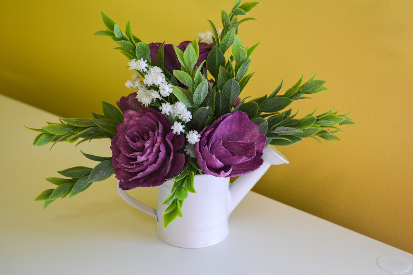 White Watering Can with Purple Flowers