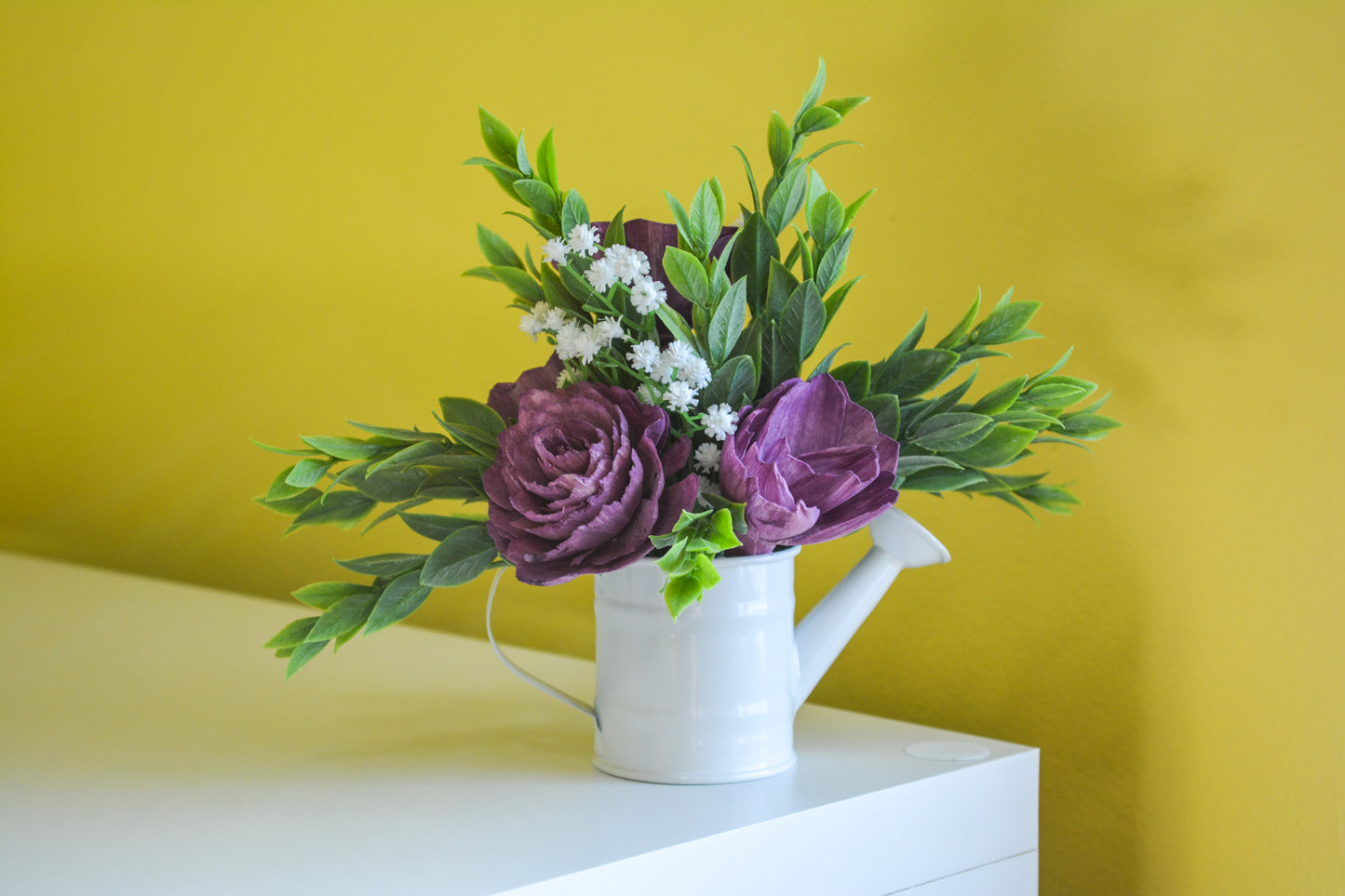 White Watering Can with Purple Flowers