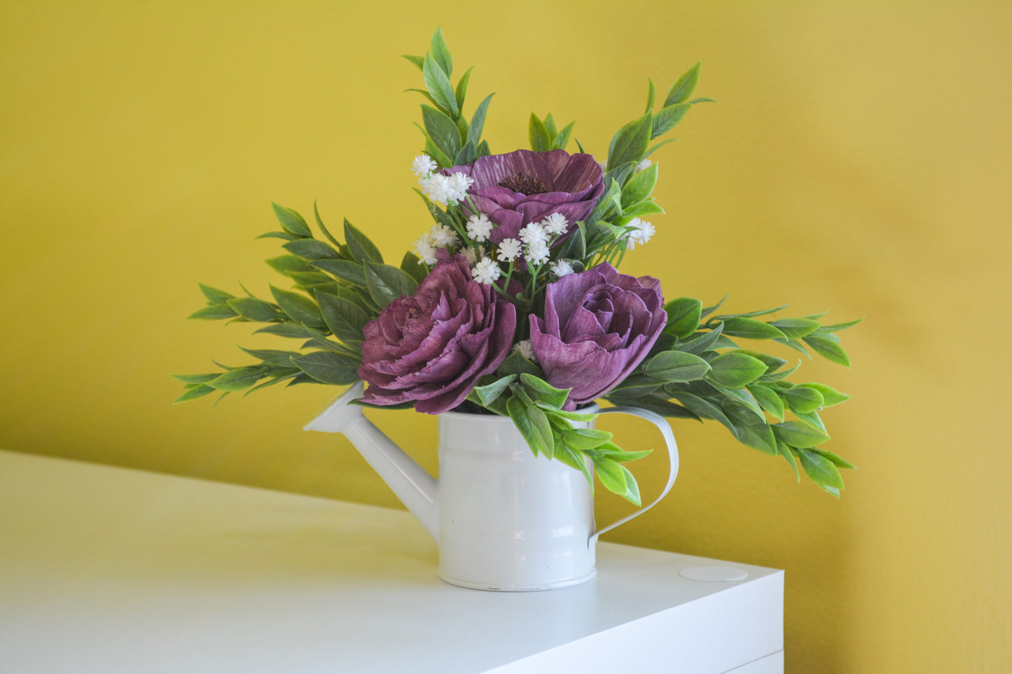 White Watering Can with Purple Flowers